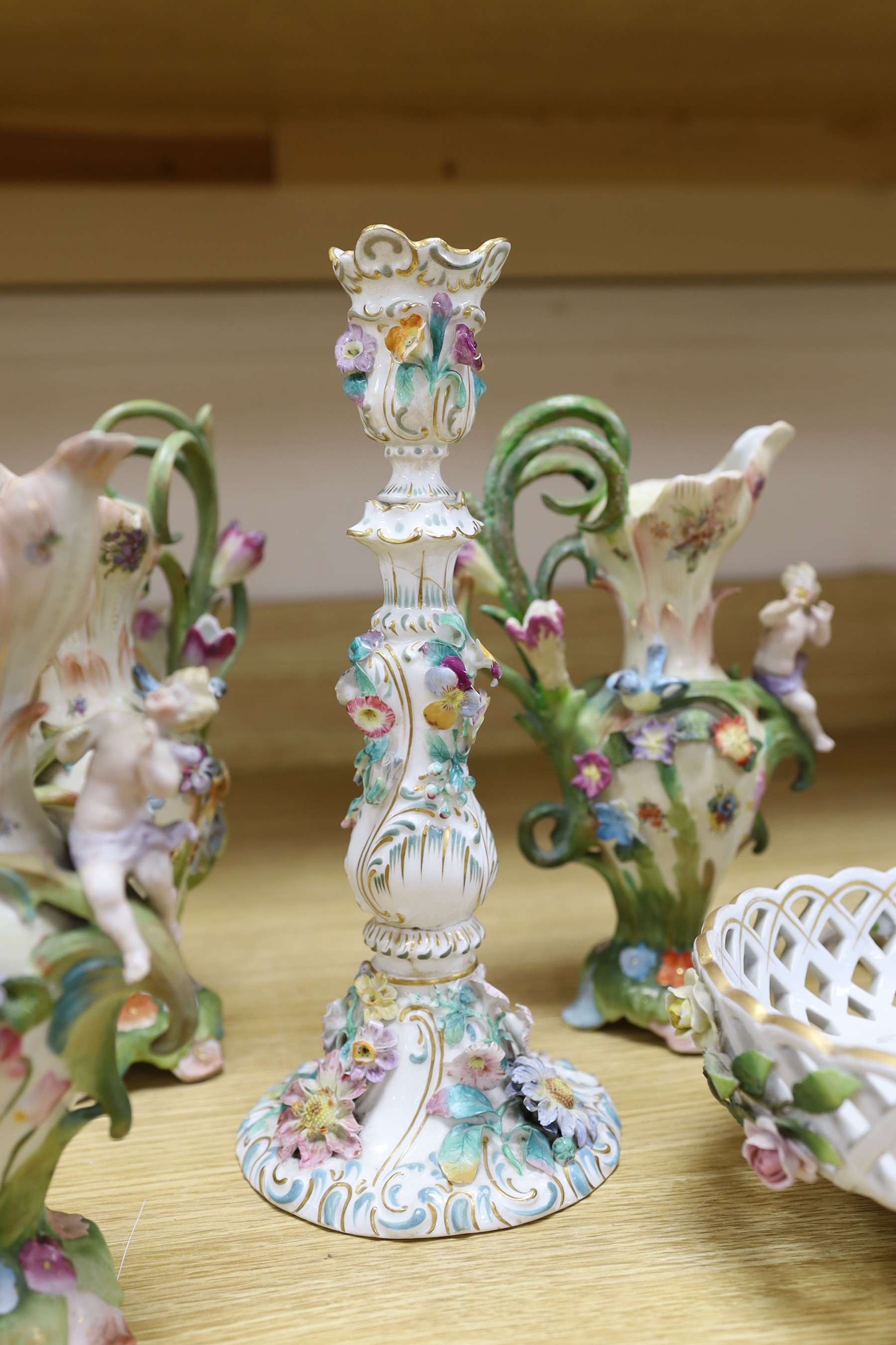 A group of 19th century and later continental floral encrusted porcelain items